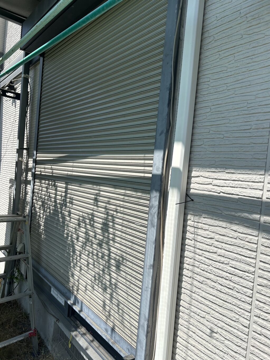 トステム製電動シャッター開閉機交換（2箇所）の修理事例