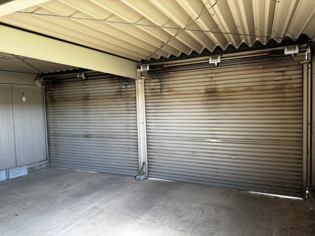 倉庫手動シャッター 応急修理対応（スラット調整）の修理事例