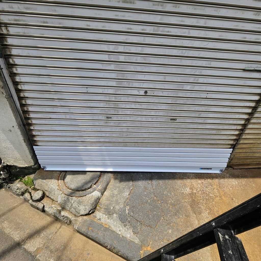 倉庫シャッターの軽量化と部品交換工事の修理事例
