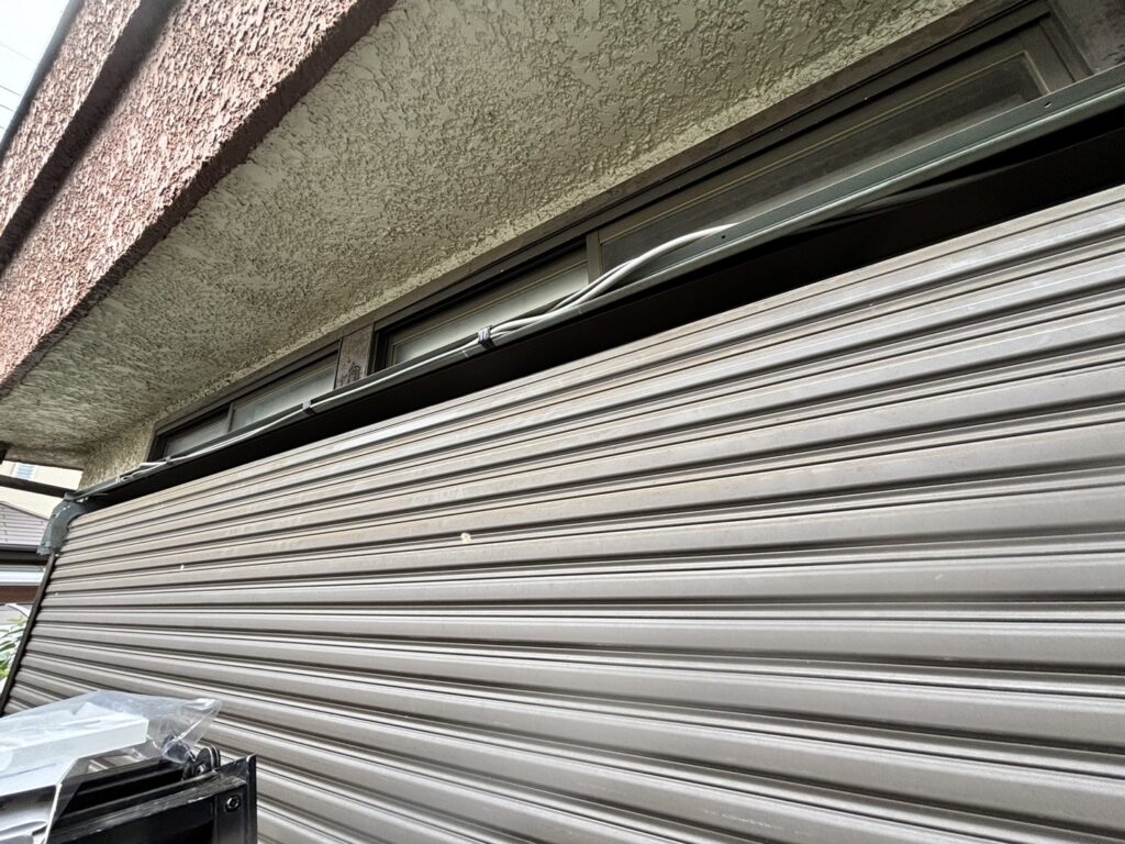 三協製幅広窓手動シャッターの開錠と鍵メンテナンスの修理事例