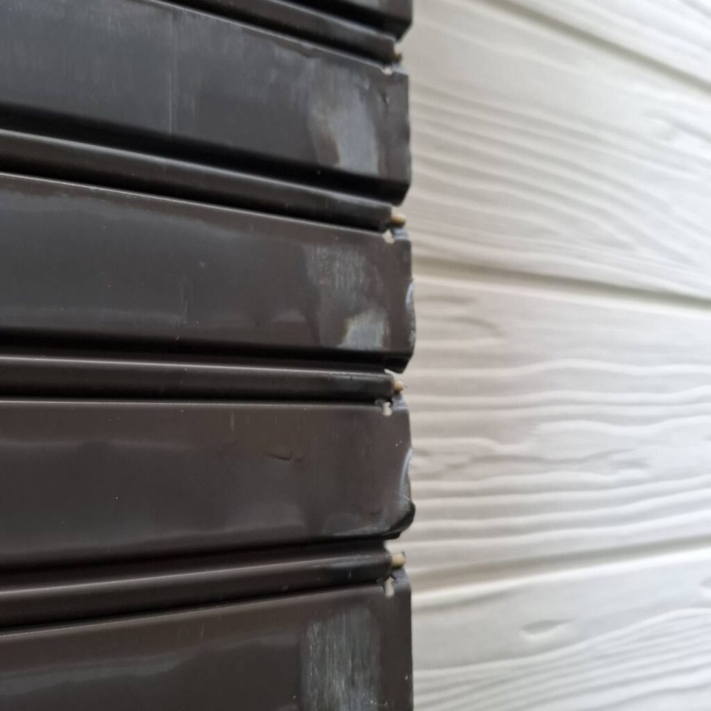 三和製窓シャッターのバネ交換の修理事例