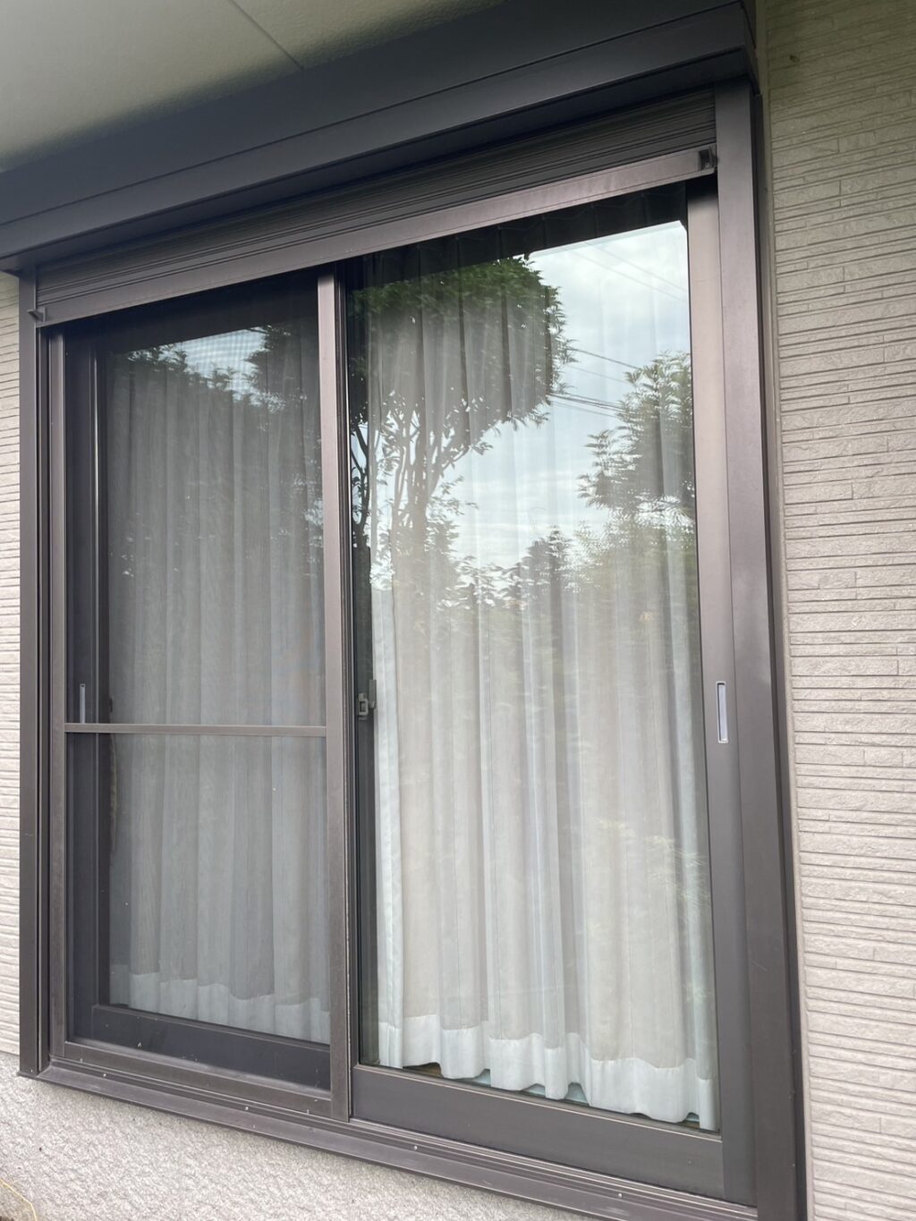 リクシル製窓手動シャッターのスラット調整の修理事例