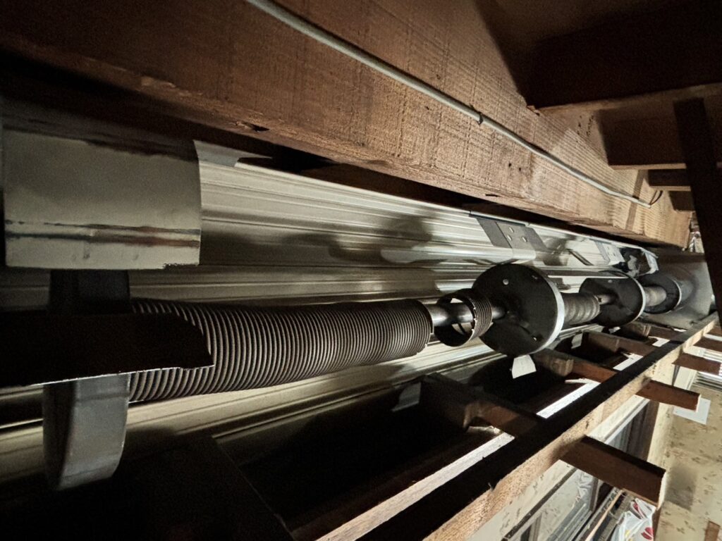 文化製電動シャッターの別置き開閉機交換の修理事例