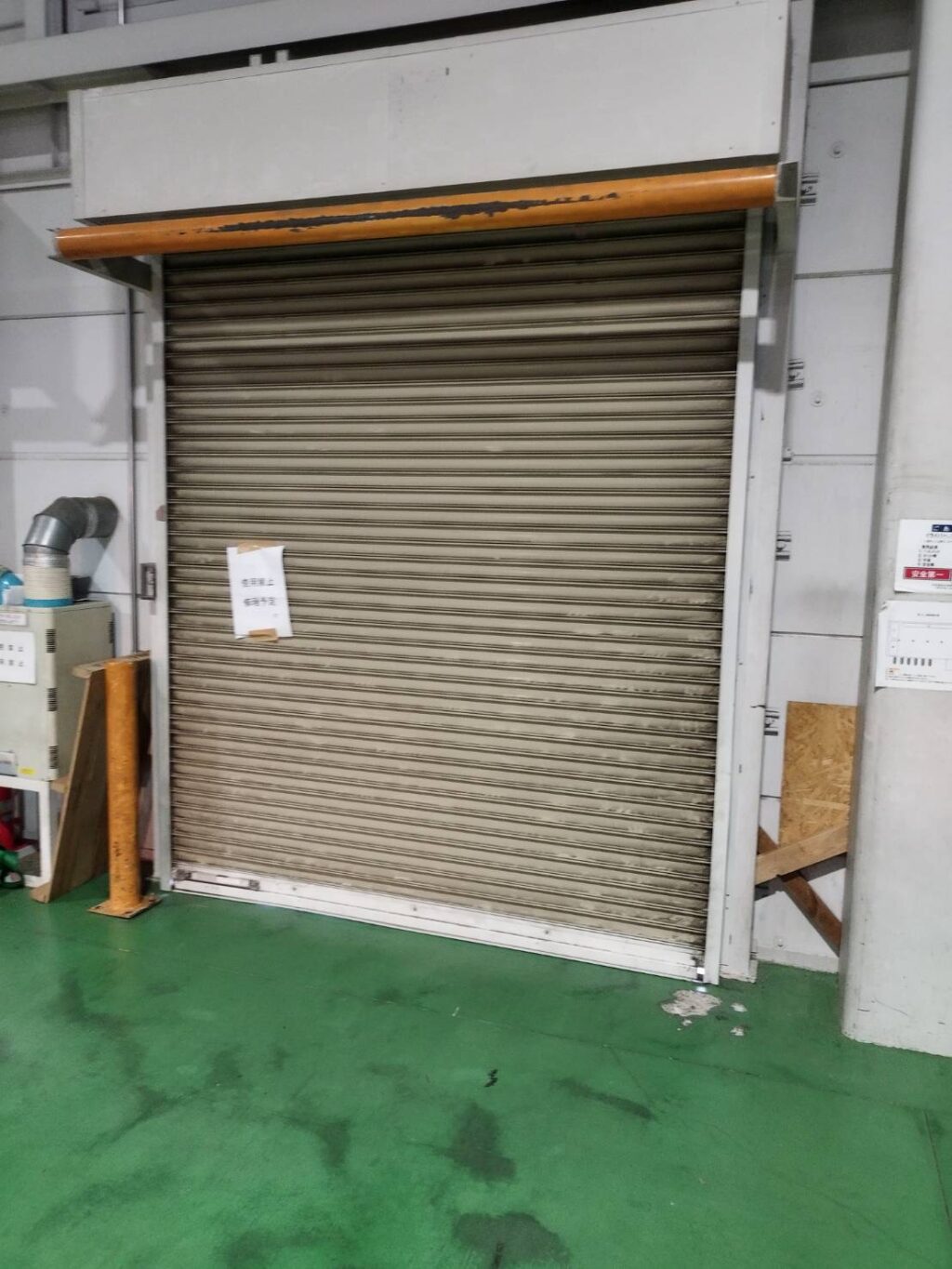 文化シャッター製手動工場シャッター／バネ交換工事の修理事例