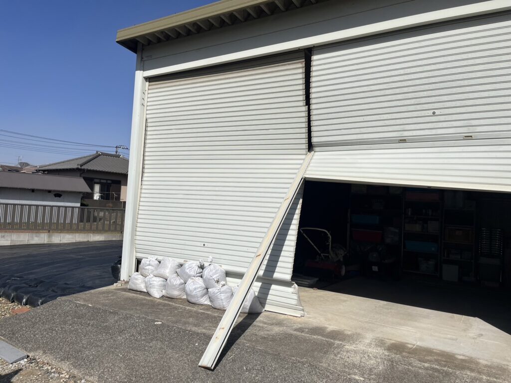 文化製ガレージシャッターの巻き込み修正工事の修理事例