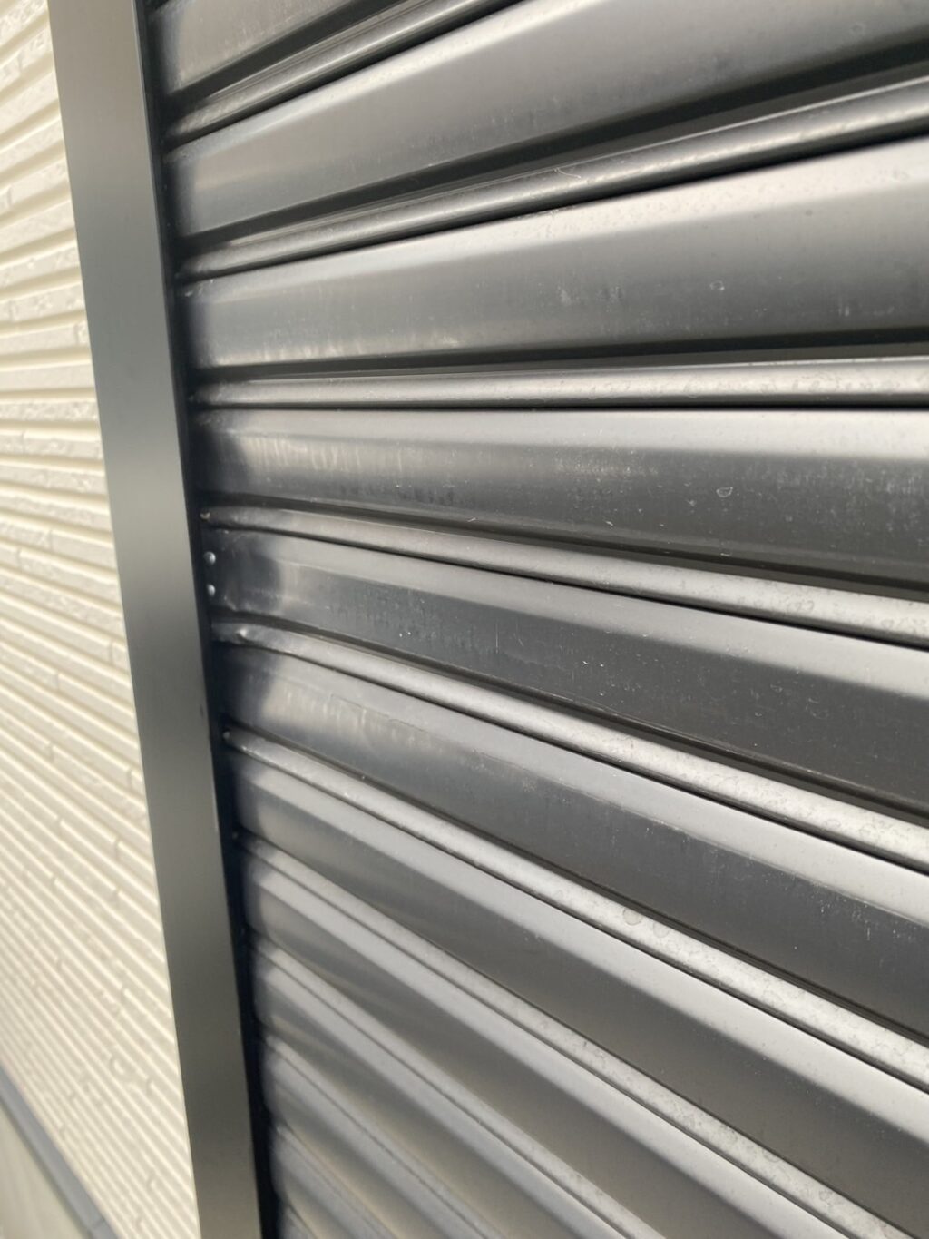 三和製車庫手動シャッターのスラット交換修理の修理事例