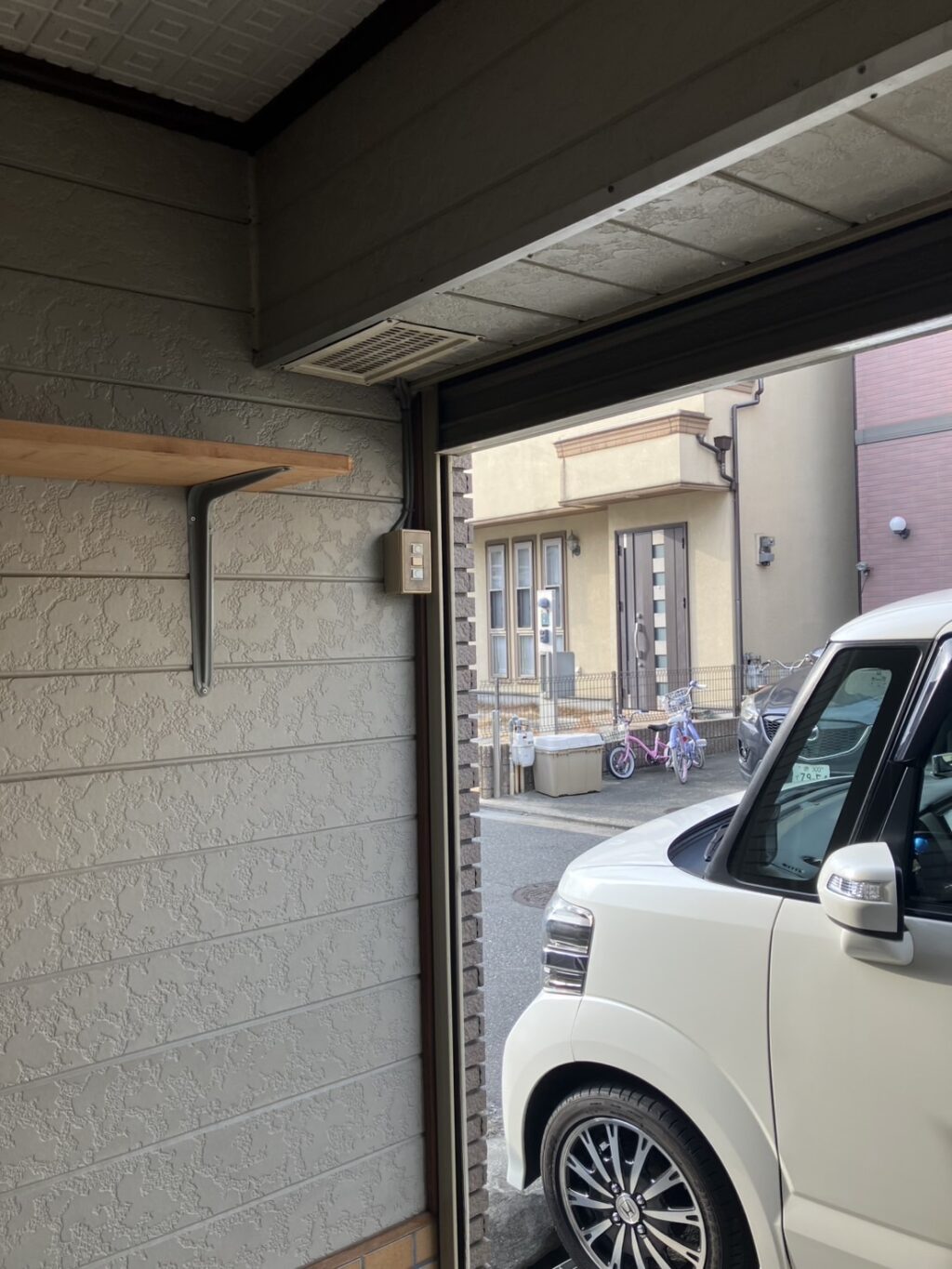 車庫手動シャッターのバネ巻き直し・スラット復旧作業の修理事例