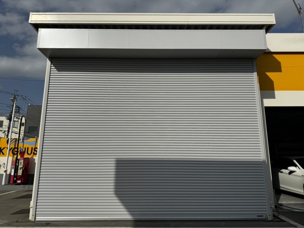 文化シャッター製電動車庫の開閉機交換の修理事例