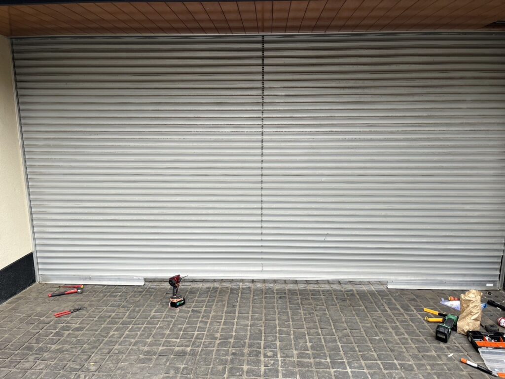 文化製車庫シャッターのリミット不良による点検と応急対応の修理事例