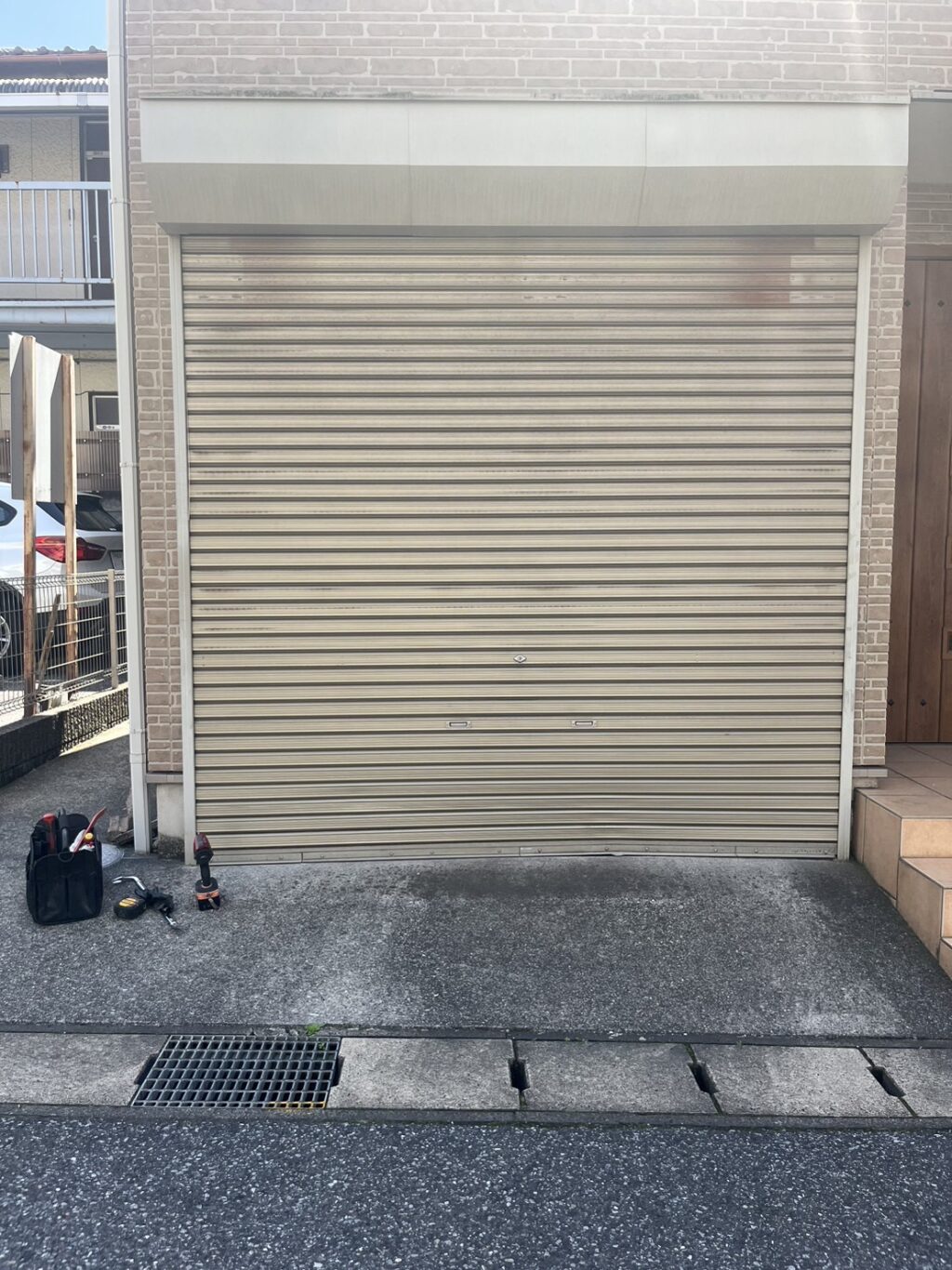 電動シャッターの開閉機・安全装置交換工事の修理事例