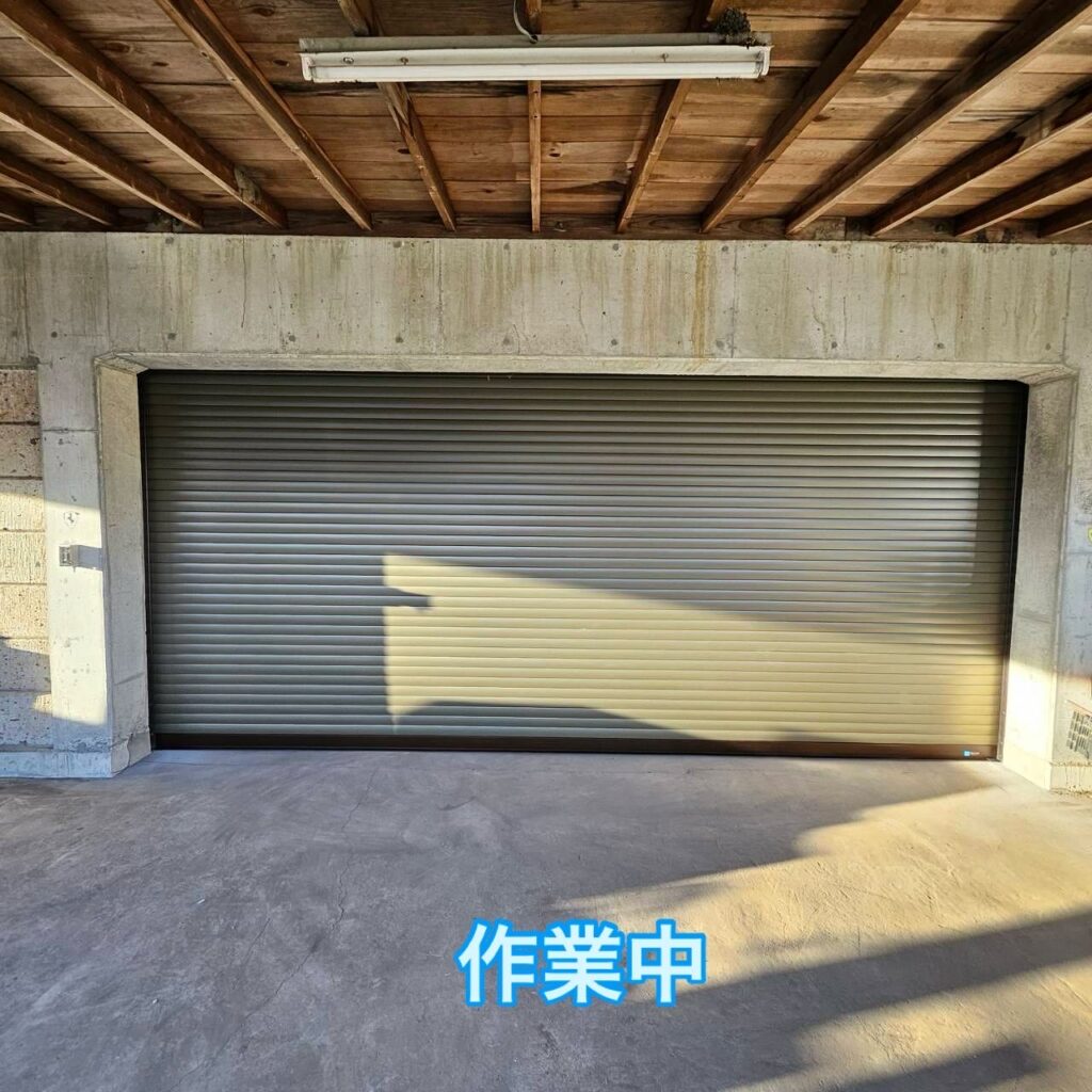 車庫手動シャッターの軽量バネ交換の修理事例