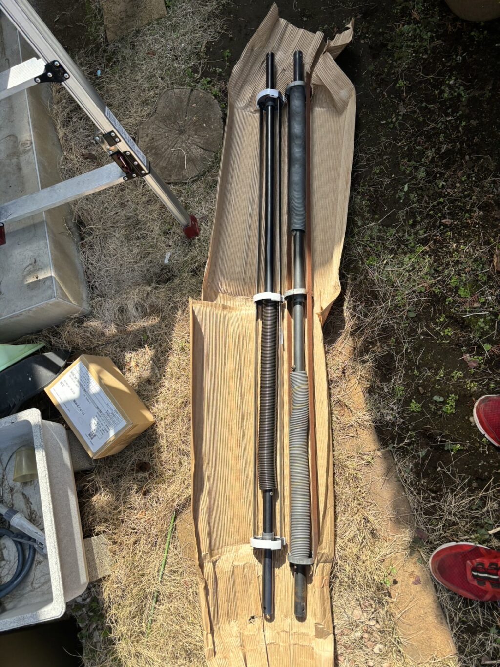 店舗手動シャッターの軽量バネ交換の修理事例